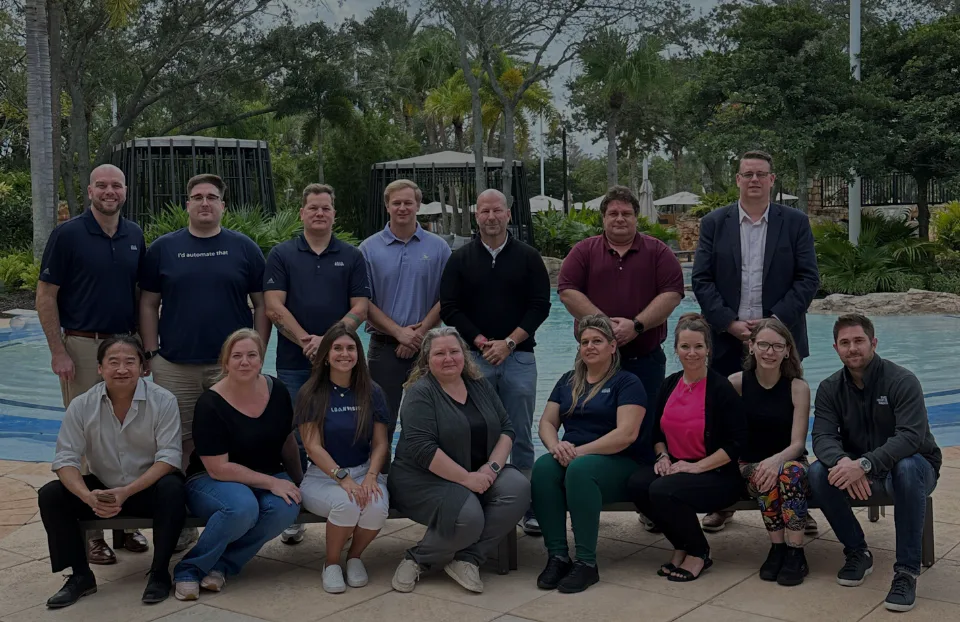Loan Vision team gathered together outdoors