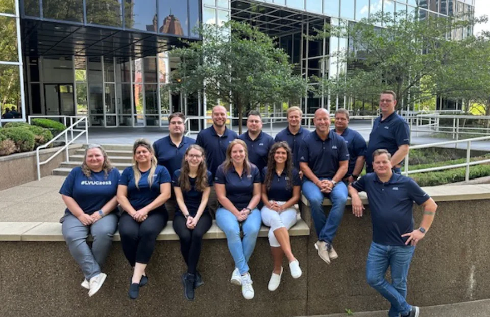 The Loan Vision team outside its office