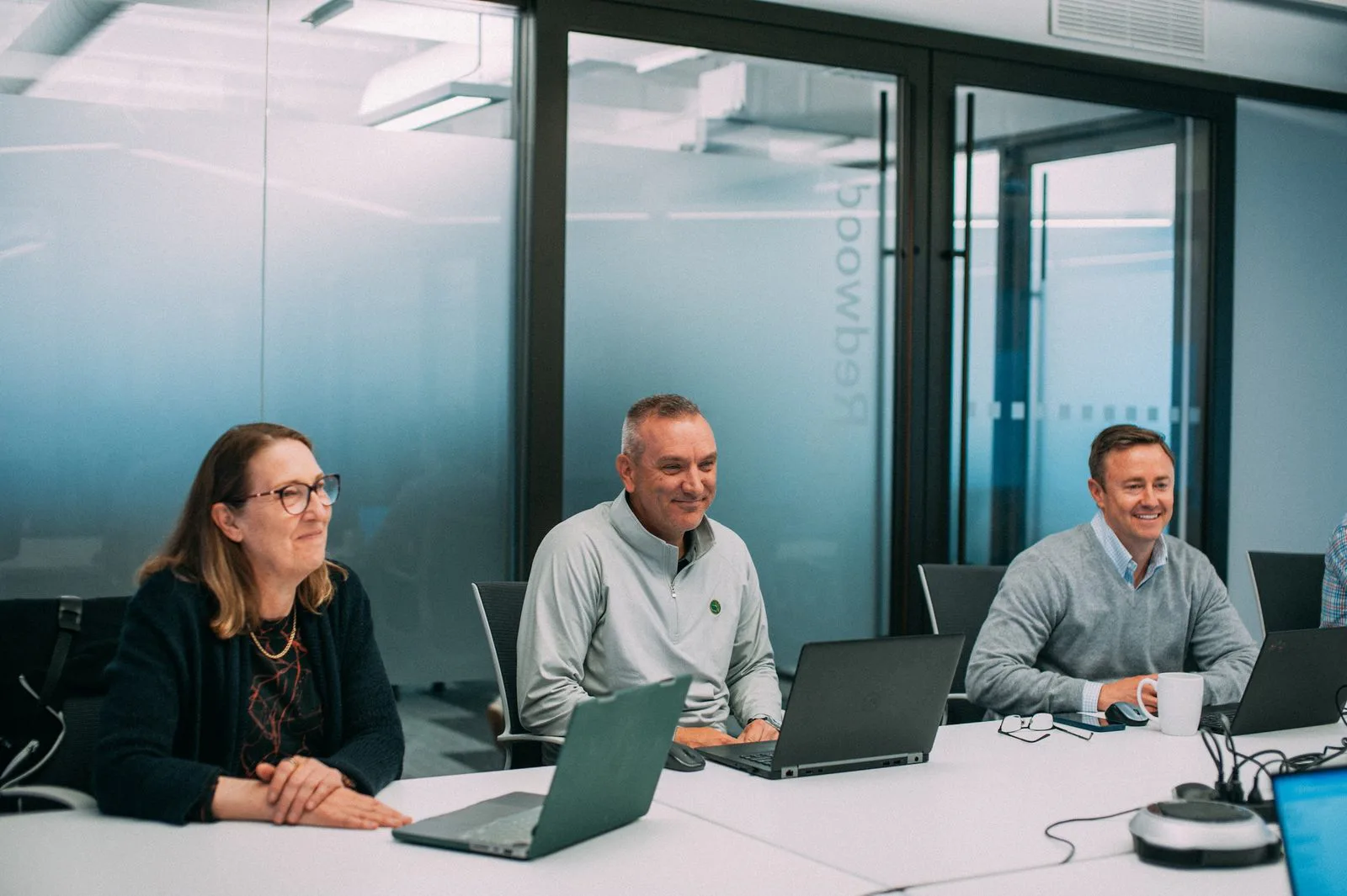 Banyan colleagues collaborating around a conference table