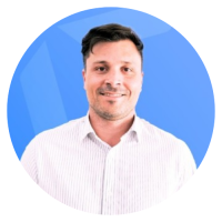 Smiling man in a light striped shirt, circular blue gradient background